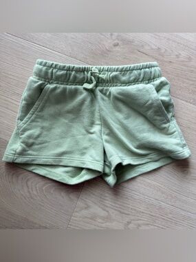 Green sweat shorts